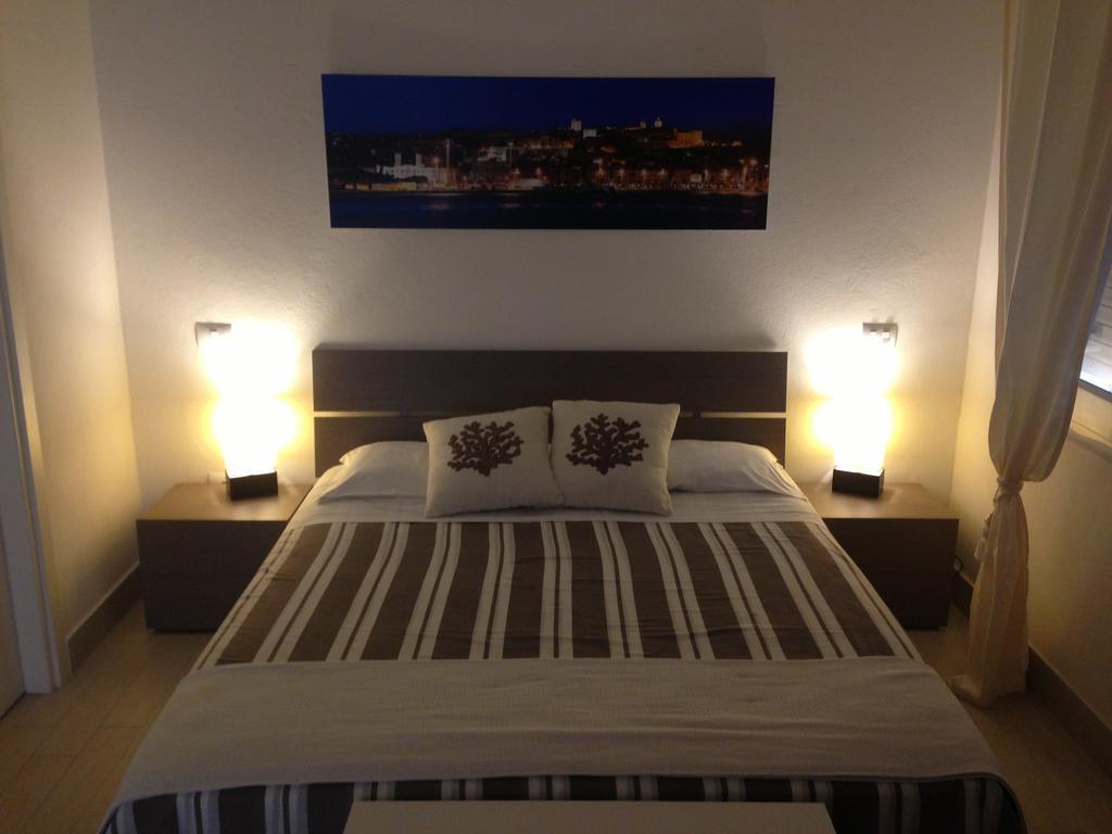 Car'Loft Beachside Cagliari Szoba fotó